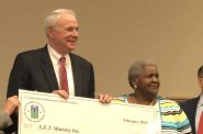 Mayor Tom Barrett and Ann Wilson accept a grant in 2018. Photo by Jeramey Jannene.