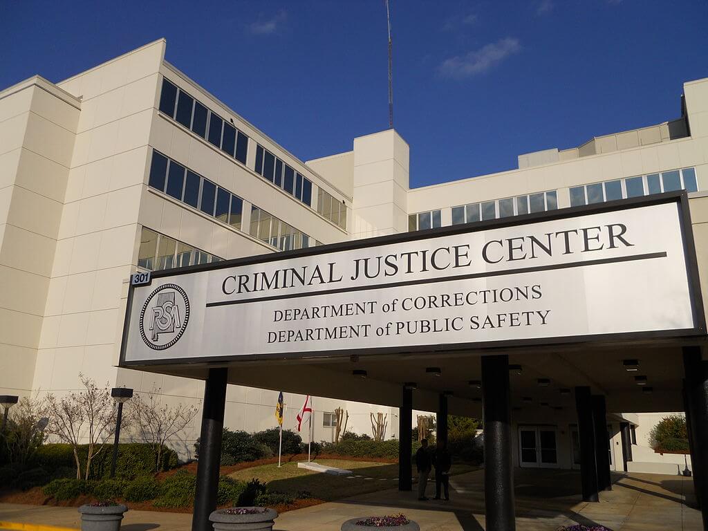 The Alabama Criminal Justice Center houses the headquarters of the Alabama Department of Corrections and the Alabama Department of Public Safety. Photo by Rivers A. Langley; SaveRivers, CC BY-SA 3.0 , via Wikimedia Commons