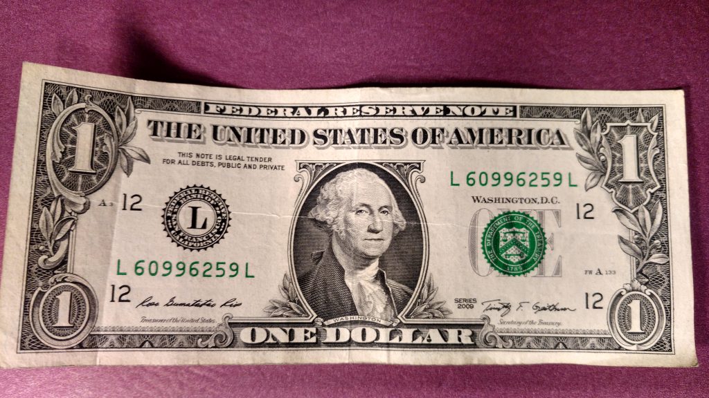 One Dollar Bill. Photo by Xchangerjunior, CC BY-SA 4.0 , via Wikimedia Commons