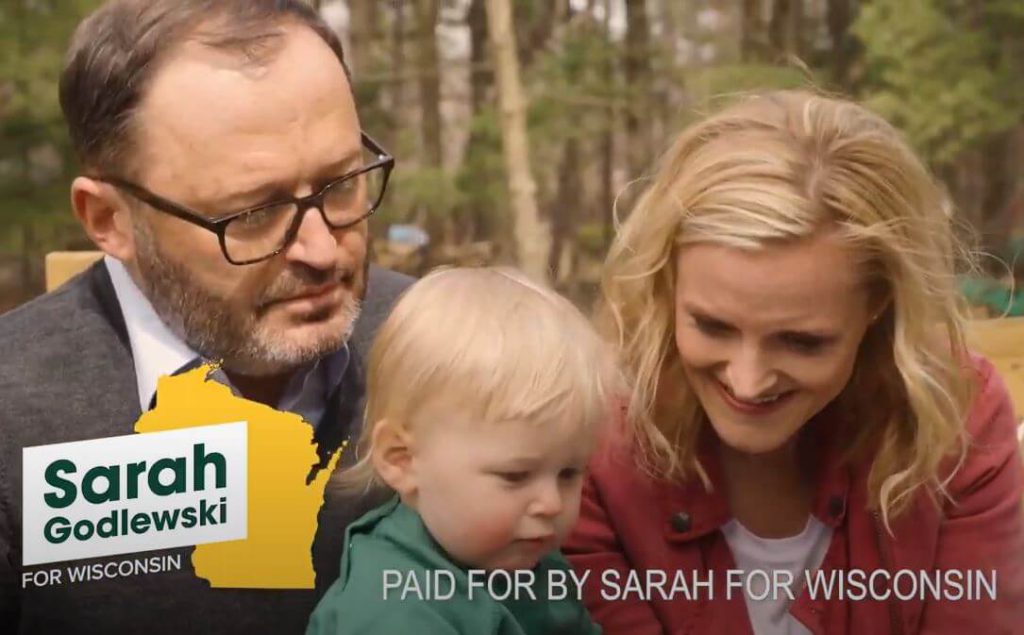U.S. Senate candidate Sarah Godlewski and her family. Campaign video via YouTube.