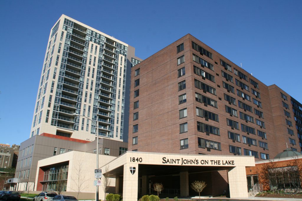 Saint John's on the Lake Central Tower (right), new connector building and North Tower (left). Photo by Jeramey Jannene.