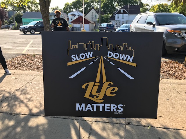 The “Slow Down, Life Matters” campaign will focus on Sherman Park and other Milwaukee neighborhoods this summer. Photo provided by Coalition for Safe Driving MKE/NNS.
