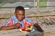 Two new programs will deliver free meals to families with children 18 and younger this summer. This photo is from a community meals event in 2014. NNS file photo.