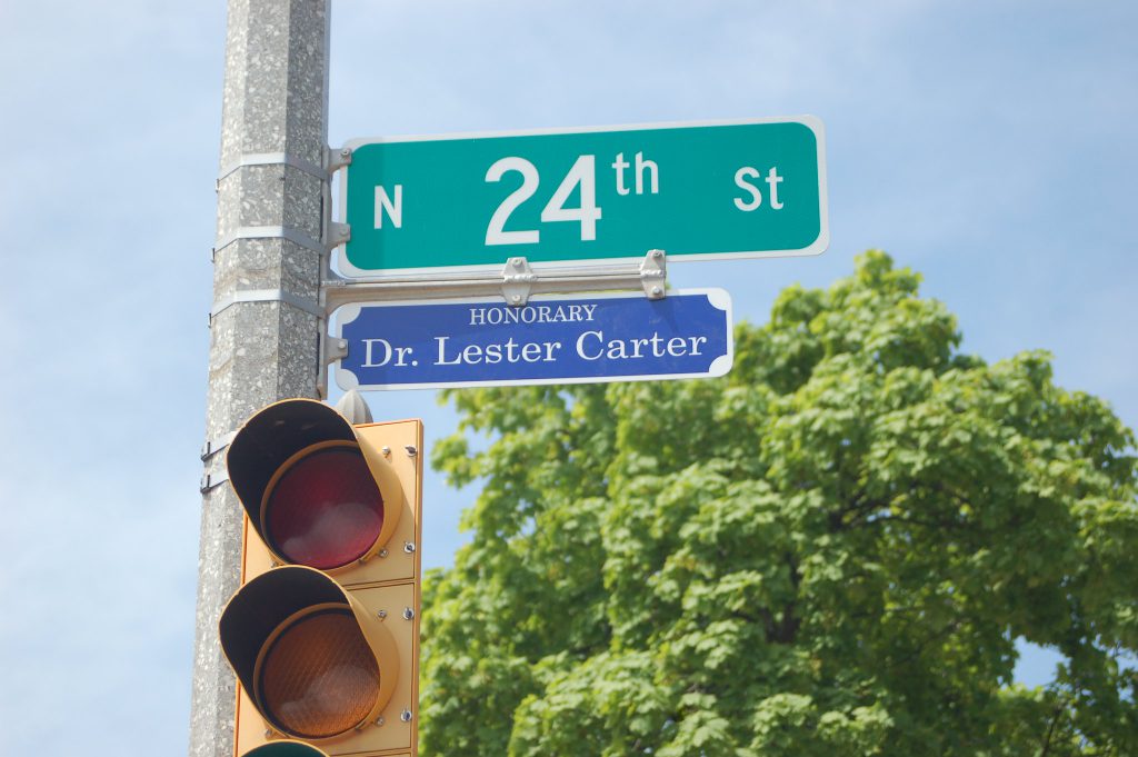 Dr. Carter has been an anchor in the community for over five decades. In 2018, the city honored his efforts by recognizing him with an honorary street sign at North 24th and West Burleigh streets. File photo by Jenny Whidden/NNS.
