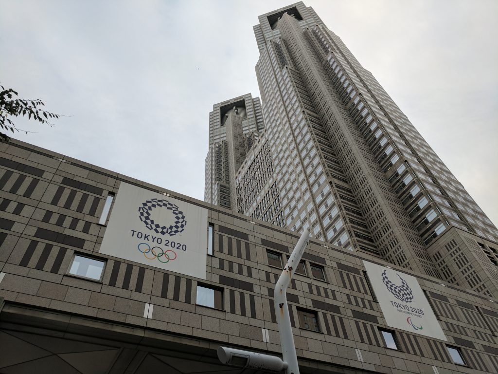 Tokyo Metropolitan Government Building with Tokyo 2020 Olympics poster. Photo by Ftaaffe, CC BY-SA 4.0 , via Wikimedia Commons