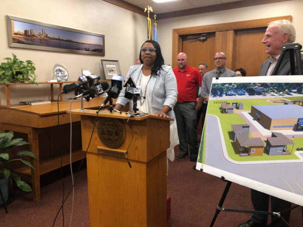 Chantia Lewis speaks at a 2019 press conference on tiny homes for veterans. Photo by Jeramey Jannene.