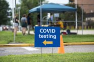 A sign points to a location on UW-Eau Claire’s campus where students can be tested for COVID-19 on Saturday Aug. 28, 2021. Angela Major/WPR