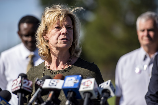 U.S. Sen. Tammy Baldwin speaks to reporters outside of Fort McCoy where Afghan refugees are staying Tuesday, Sept. 7, 2021, between Sparta and Tomah, Wis. Angela Major/WPR