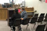 Ald. Chantia Lewis confers with attorney Michael Maistelman before intake court hearing. Photo by Jeramey Jannene.