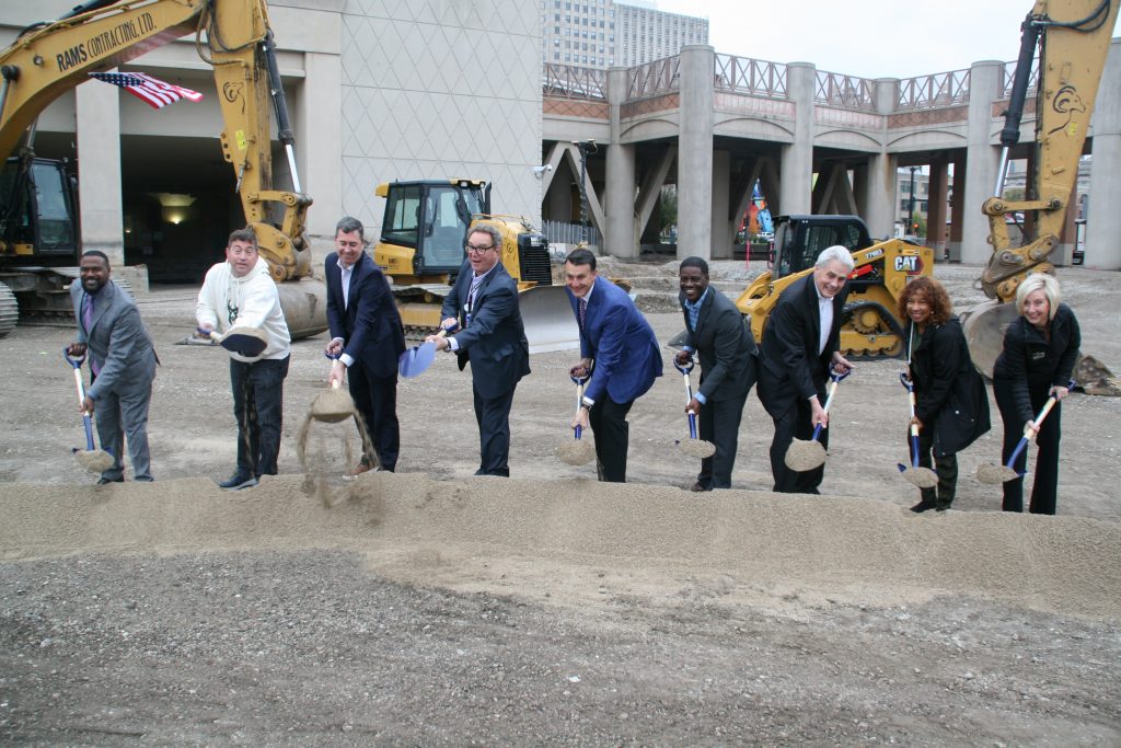 DCD Commissioner Lafayette Crump, Bucks President Peter Feigin, DOA Secretary Joel Brennan, WCD CEO Marty Brooks, WCD Board Chair Jim Kanter, County Executive David Crowley, Alderman Robert Bauman, VISIT board chair Eve Hall and VISIT CEO Peggy Williams-Smith break ground on the Wisconsin Center expansion. Photo by Jeramey Jannene.