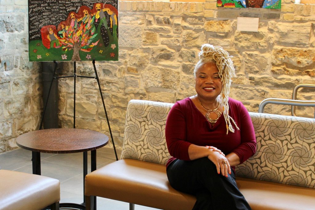 Dr. Lia Knox sits inside of Nō Studios, which hosts Black Space. The program provides group therapy for Black and brown residents. Photo by Matt Martinez/NNS.