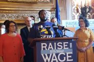 James Rudd speaks in favor of a bill to increase Wisconsin’s minimum wage at a Capitol press conference June 17 with Sen. Melissa Agard, right, the bill’s author. Photo by Erik Gunn/Wisconsin Examiner.