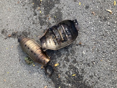 A heat shield lies on the ground after thieves stole the catalytic converter from Madison resident Paul Schechter's truck in August 2021. Photo Courtesy of Paul Schechter/WPR.