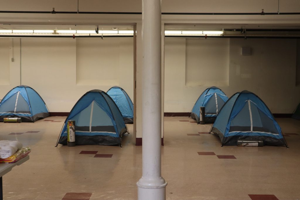 Tents in the Street Angels warming room. Photo by Isiah Holmes/Wisconsin Examiner.