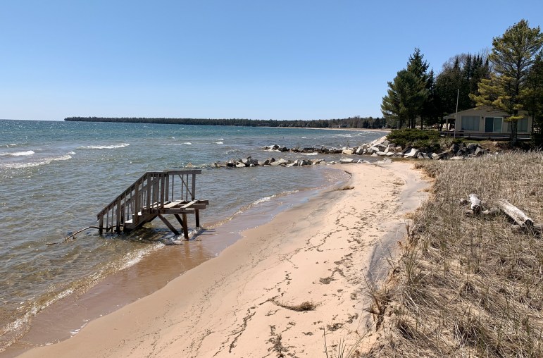 The position of steps going into Whitefish Bay in Door County illustrates erosion along the beach. Photo taken May 12, 2020. Myles Dannhausen Jr. / Door County Pulse.