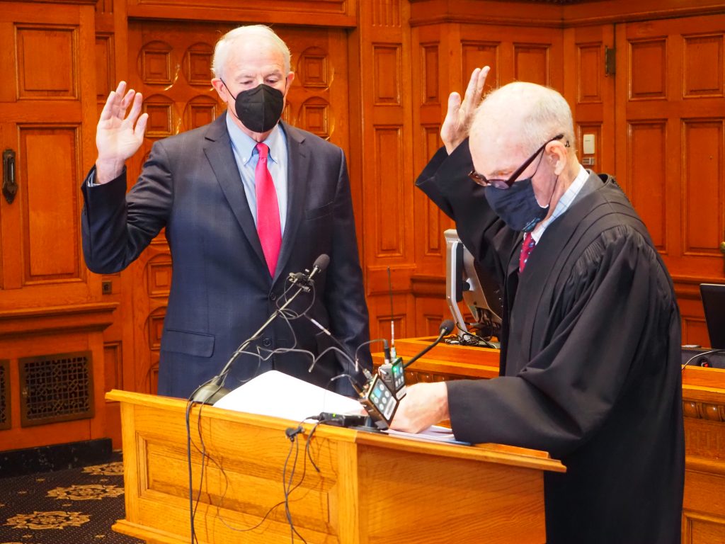 Tom Barrett takes his oath from Judge Lynn Adelman to Become U.S. Ambassador to Luxembourg. Photo by Jeramey Jannene.