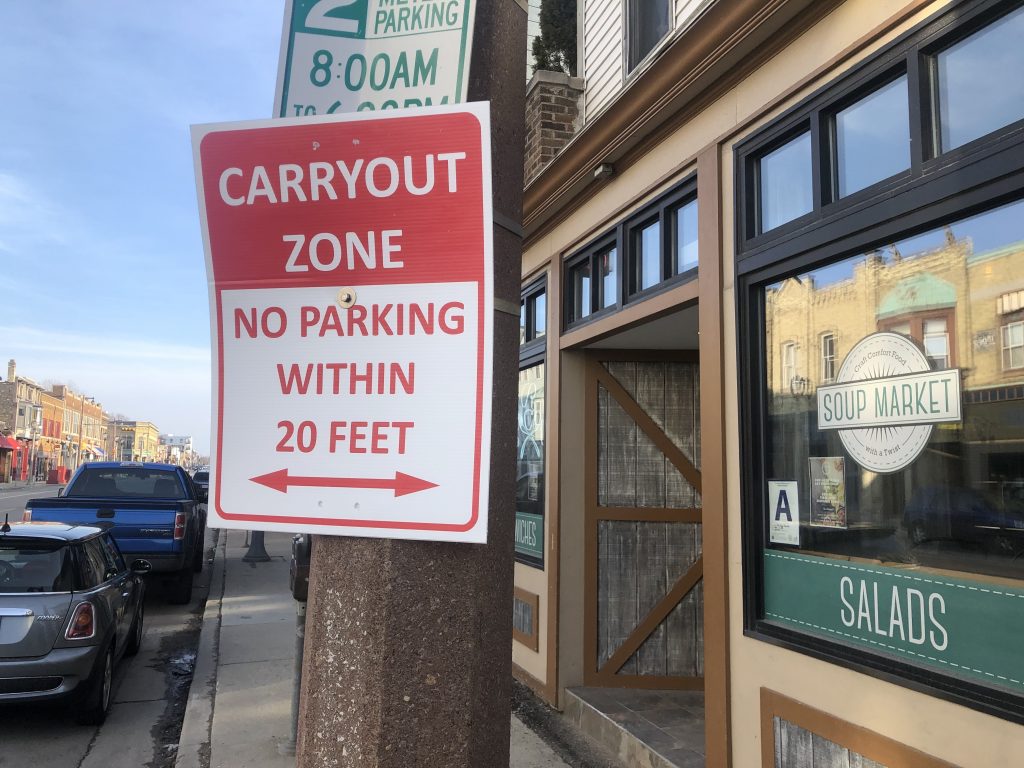 Carryout zone sign on S. Kinnickinnic Ave. Photo by Jeramey Jannene.
