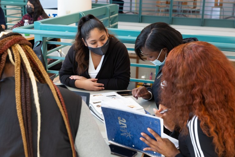 Students at Milwaukee Area Technical College spend time together in the Student Center. MATC has numerous programs aimed at broadening access to a college education, including free tuition and debt forgiveness to qualifying students and dual enrollment programs that allow high school students to earn college credit. Courtesy of MATC
