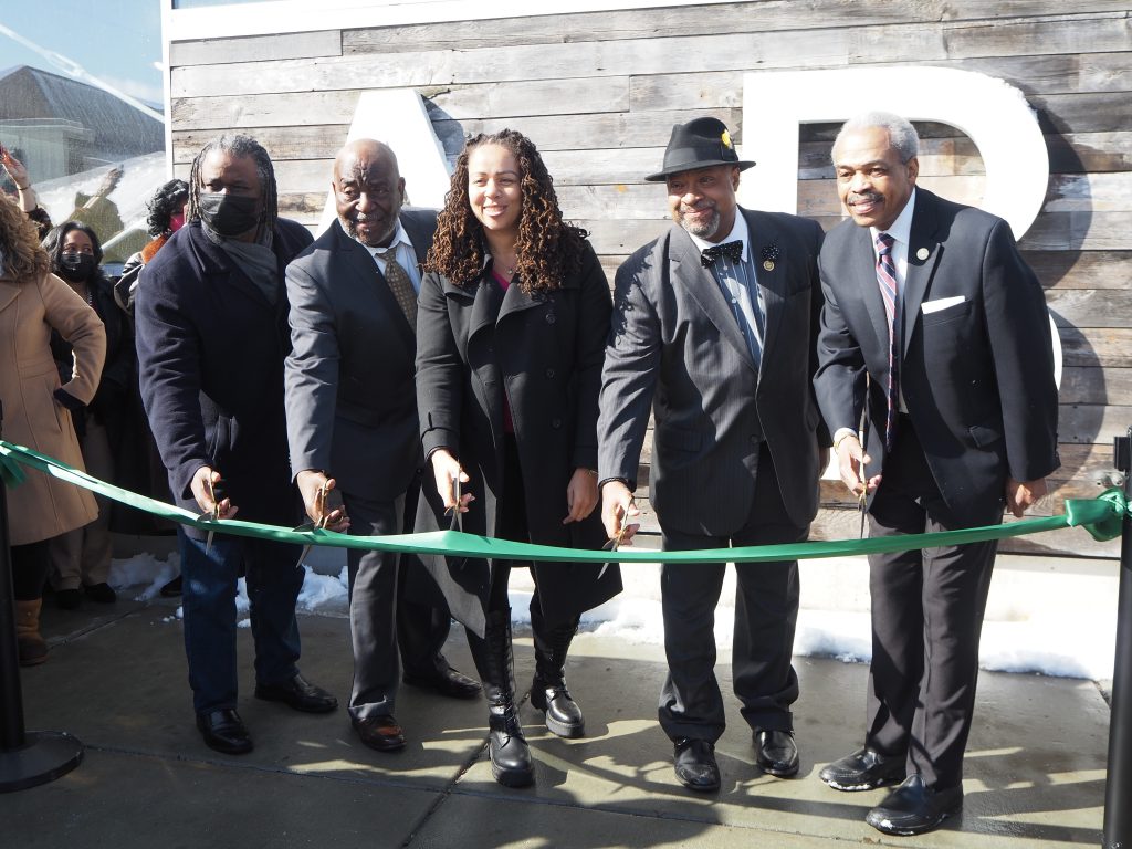Brad Pruitt, Virgil Cameron, Melissa Allen, Bert Davis and Ralph Hollman Cut Ribbon on America's Black Holocaust Museum. Photo by Jeramey Jannene.