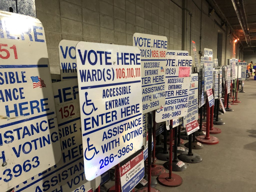 Vote here signs. File photo by Jeramey Jannene.