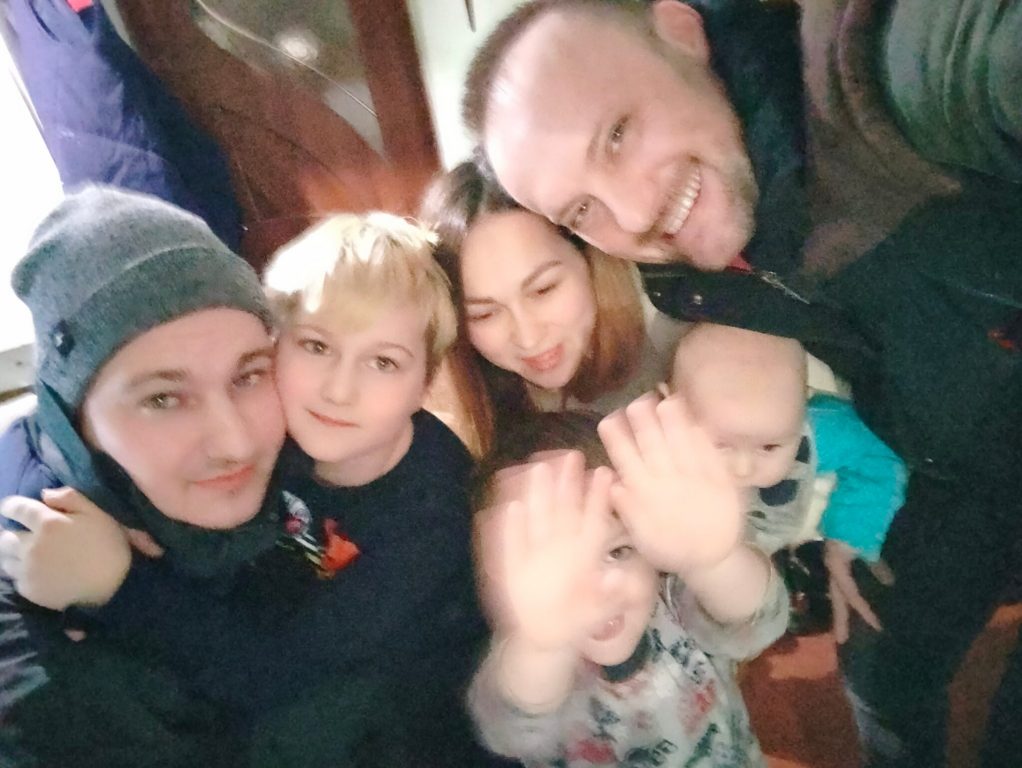 Victor (right) took this photo as he said goodbye to his aunt, her three children (including his godson) and their father before they started their journey to leave Ukraine. Photo provided by Victor Valionta/NNS.