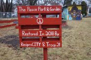 A sign near one of the Peace Gardens in Milwaukee. Photo by Isiah Holmes/Wisconsin Examiner.