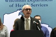 On March 14, 2022 Gov. Tony Evers appeared at the Alliant Energy Center in Dane County where he thanked healthcare workers and the National Guard for helping during the pandemic. Two years earlier, the Democratic governor had declared a public health emergency which would later kill more than 12,000 residents. Shamane Mills/WPR