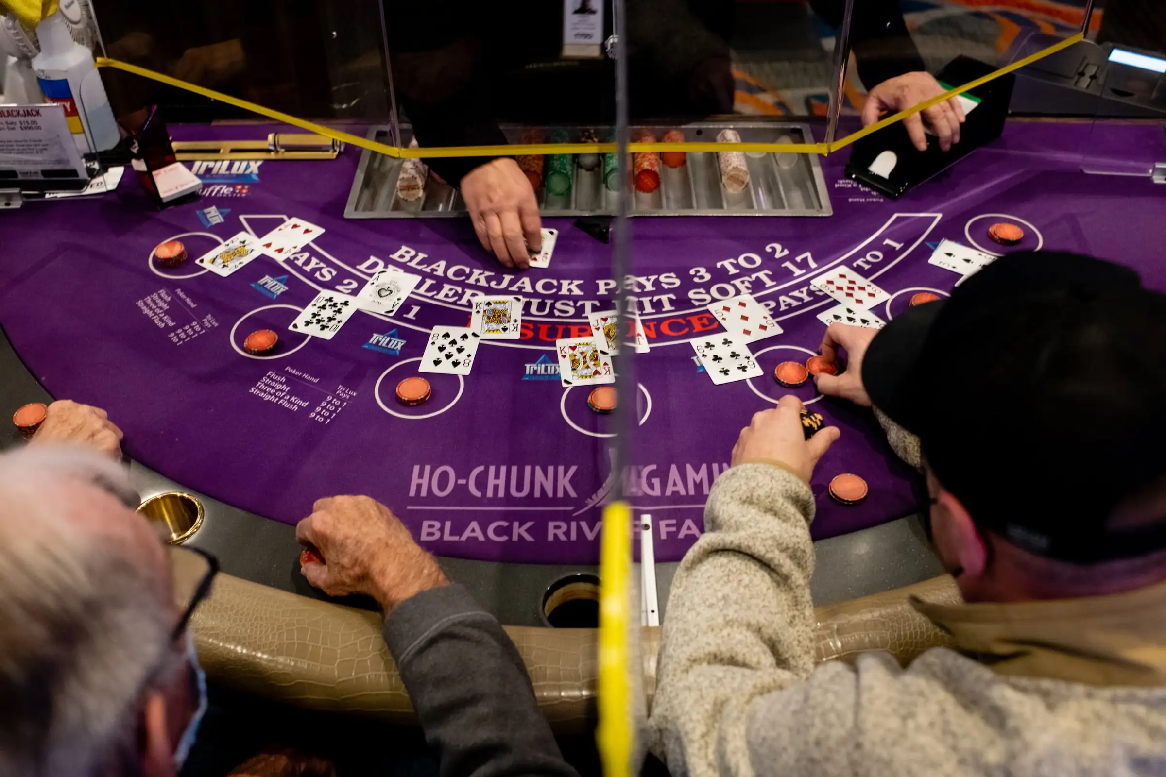 A blackjack table is seen at Ho-Chunk Gaming Black River Falls in Black River Falls, Wis., on Feb. 9, 2022. “When we see anything less profitable, there’s a thought of, ‘Is it worth it?’”, said Ho-Chunk Nation President Marlon WhiteEagle of his tribe’s investment in casinos. (Ilana Bar-av for Wisconsin Watch)