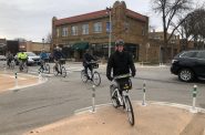 Wauwatosa Mayor Dennis McBride, followed by Milwaukee Mayor Cavalier Johnson, ride new Bublr e-bikes. Photo by Jeramey Jannene.