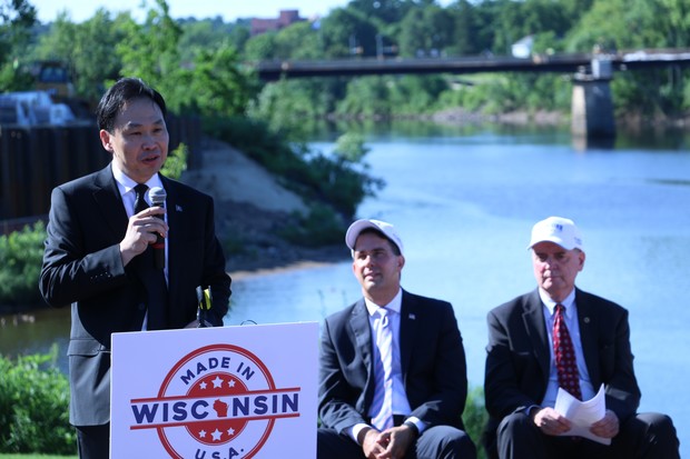 Foxconn Director of U.S. Strategic Initiatives Alan Yeung announces the company will purchase two buildings in downtown Eau Claire for a company research technology hub and a business incubator. Yeung said Foxconn the development will lead to 150 jobs in Eau Claire. The company hopes to acquire the two buildings by the end of 2018 with operations beginning in early 2019. Rich Kremer/WPR