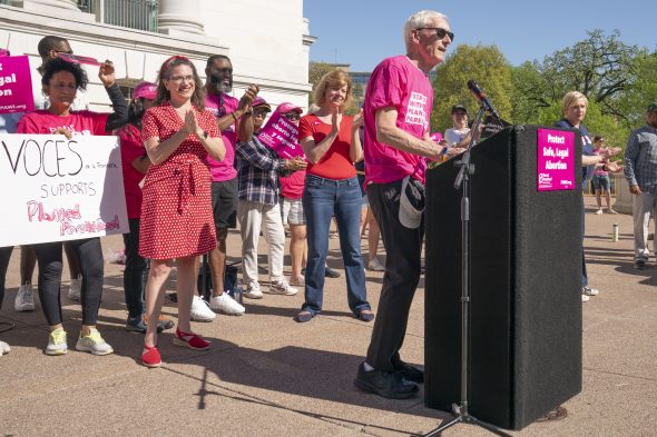 Gov. Tony Evers addresses the crowd at a prochoice rally at the Capitol on May 14, 2022. Photo by Luther Wu/Wisconsin Examiner.