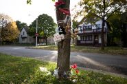 Toys and flowers are tied to a tree in the Sherman Park neighborhood Tuesday, Oct. 26, 2021, in Milwaukee, Wis. Angela Major/WPR