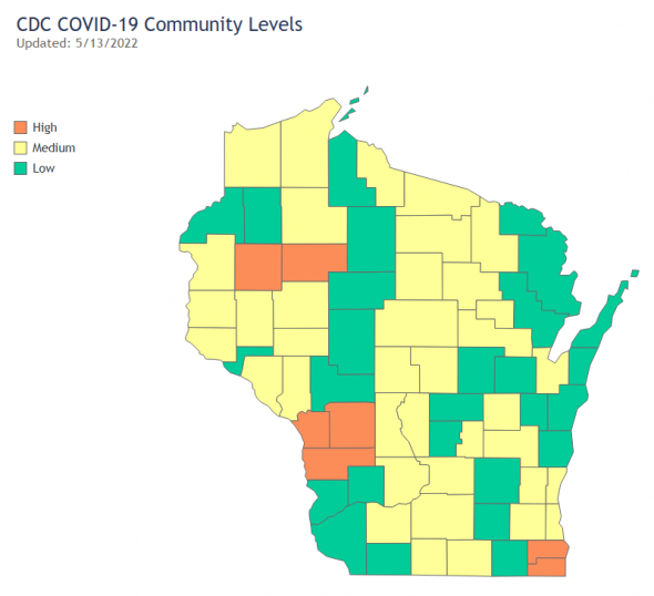 This CDC graphic, posted by the Wisconsin Department of Health Services (DHS), shows counties’ “COVID-19 community level” as of Friday, May 13: Low (green), Medium (yellow) or High (Orange). See table at the end of this story for the threshold statistics used to assign a county’s community level. CDC graphic via DHS.