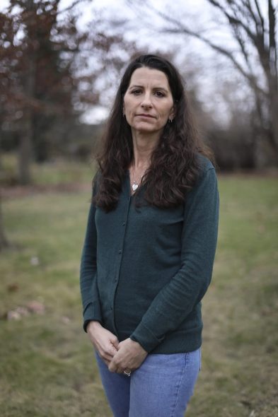 Judy Stevens, 51, was diagnosed with Lyme disease in July 2017, but thinks she may have had it since childhood. Her symptoms included brain fog, depression, insomnia, and she said she was often treated as a psychiatric patient by the more than 30 different doctors she saw. Prior to remission in 2020, she says she was taking more than 40 herbs and supplements a day. She estimated it cost her $25,000 to $50,000 a year to treat her Lyme disease. “It was a huge strain on us. I can’t even imagine not having the resources,” she said. “This is people’s reality. It’s really costly to get better and stay better.” She is pictured at her home in Wauwatosa, Wis., on Dec. 1, 2021. (Coburn Dukehart / Wisconsin Watch)