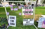 Visitors hung notes on a display at the International Overdose Awareness Day memorial event at Zeidler Union Square in downtown Milwaukee last year. Photo by Edgar Mendez/NNS.