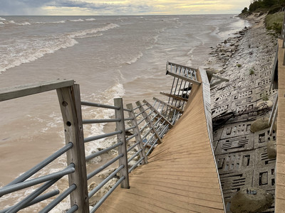 A mangled ramp is seen at Point Beach State Forest in Manitowoc County, Wis., on Sept. 23, 2021. The ramp has gone unfixed since a winter storm hammered the beach in 2018. Just as local homeowners have watched Lake Michigan’s waves flood and erode their property, Wisconsin may see more damage to its shoreline parks. Scientists expect erosion to worsen as climate change brings more volatility to Great Lakes water levels. Mario Koran/Wisconsin Watch