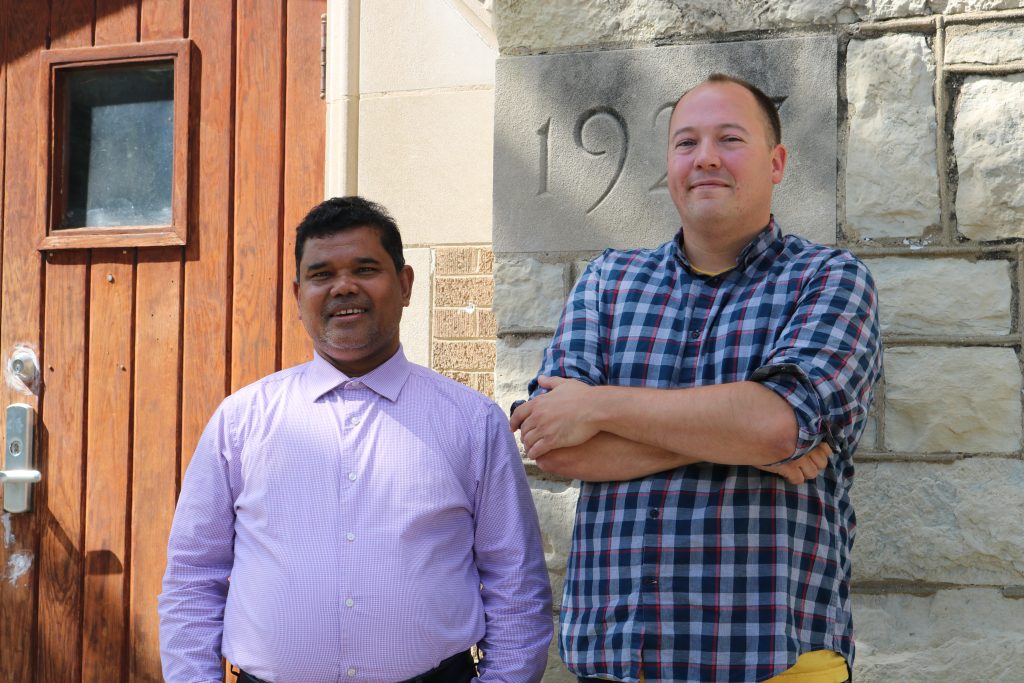 Anuwar Kasim and Andrew Trumbull in front of the BRCW Community Center. Photo taken July 31, 2022 by Sophie Bolich.