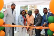 Ald. Khalif Rainey, Yashica Spears, Maurice Wince, Mayor Johnson and Commissioner Crump at the grand opening of Sherman Park Grocery. Photo taken July 15, 2022 by Sophie Bolich.