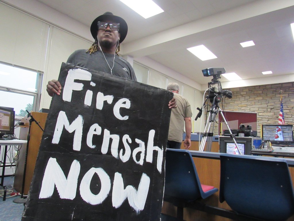 Protesters gather at Wauwatosa’s City Hall. They called for the firing of Officer Joseph Mensah, but also for the implementation of body cameras at the police department. Photo by Isiah Holmes/Wisconsin Examiner.
