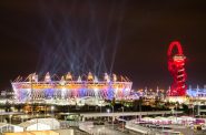 Olympic stadium and The Orbit during London Olympics opening ceremony. Photo by Alexander Kachkaev, CC BY 2.0 , via Wikimedia Commons