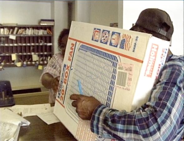 A man receives a box fan in Milwaukee during a July 1995 heat wave that saw temperatures reach as high as 103 degrees. The county medical examiner would attribute 91 deaths to the heat wave. That same heat wave killed hundreds more in Chicago, and it led communities across the country to adopt heat wave action plans. (Screenshot from 1995 TMJ4 News report)