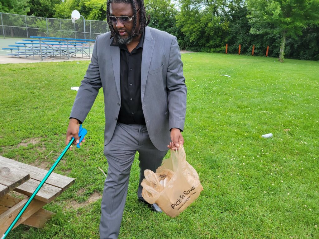 Anthony Keys, 47, who earned his pardon after two decades, often cleans up trash at Merrill Park and mentors youths in the neighborhood. Photo by Edgar Mendez/NNS.