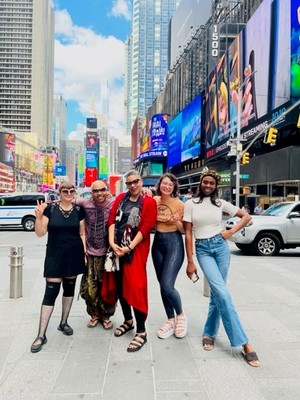 Students from the Edessa School of Fahsion pose in Times Square in New York City during New York Fashion Week. From left to right: Stephanie Schultz, Andre Purdy, school Dean of Academics Lynne Dixon-Speller, Sabrina Lombardo and Keerah Carter. Photo courtesy of Lynne Dixon-Speller/WPR.