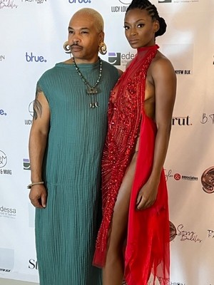 Edessa School of Fashion student Andre Purdy, left, and a model wearing one of his designs while students from the school joined New York Fashion Week and related shows. Photo courtesy of Lynne Dixon-Speller/WPR.
