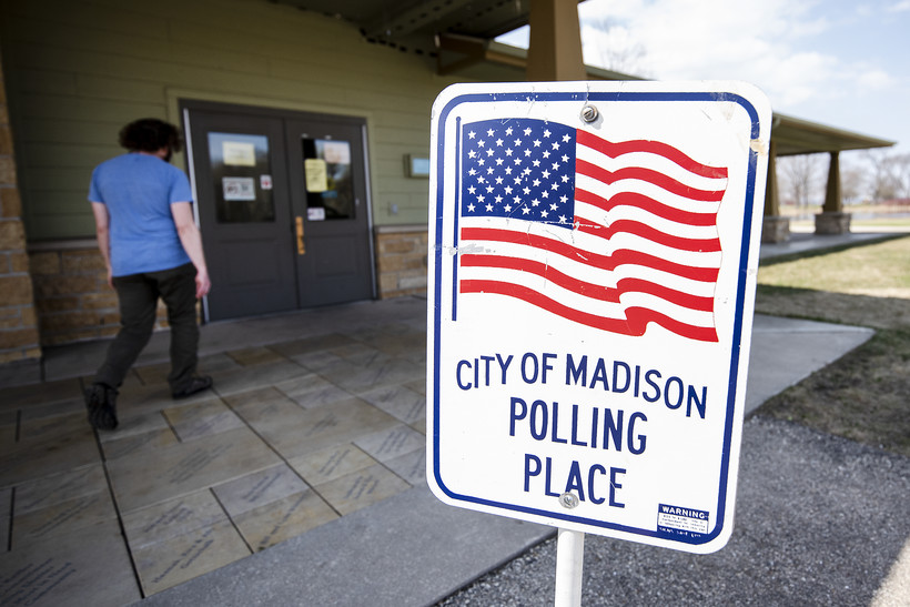 A voter walks up to a polling location Tuesday, April 6, 2021, at Tenney Park in Madison, Wis. Angela Major/WPR