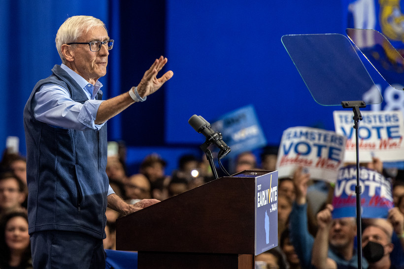 Gov. Tony Evers waves to a crowd before speaking Saturday, Oct. 29, 2022, at North Division High School in Milwaukee, Wis. Angela Major/WPR