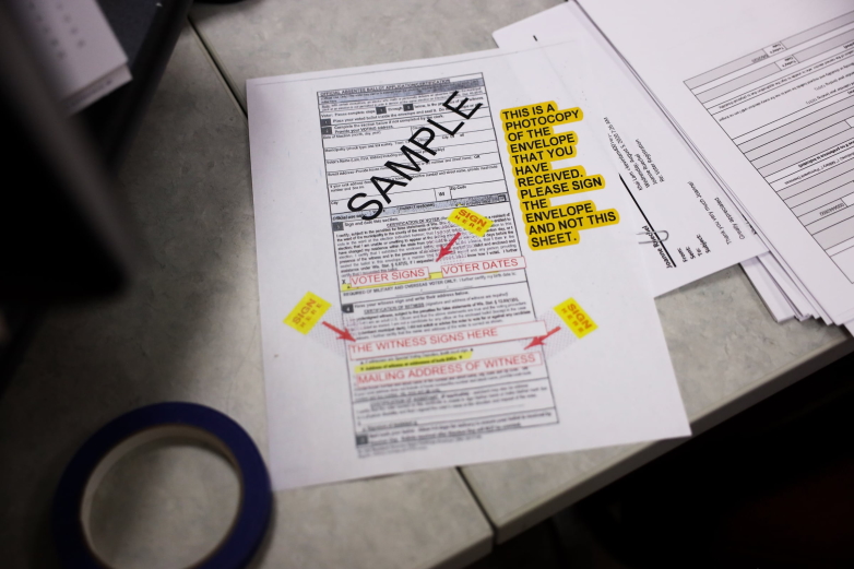 Joanne Ruechel, town clerk of Rib Mountain, Wis., included a sample ballot with instructions on how to fill it out, ahead of the 2020 primary to try to prevent errors. She made these instructions by hand, as they were not provided by the county or state for the election. Photographed Aug. 11, 2020. (Coburn Dukehart / Wisconsin Watch) (Coburn Dukehart / Wisconsin Watch)