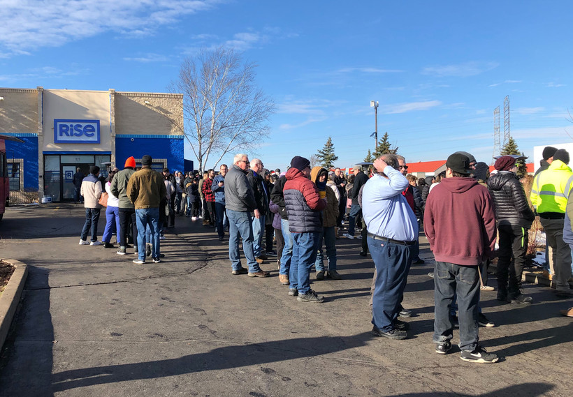 Hundreds of people have been waiting in line at RiSE in Mundelein, Illinois, the closest dispensary to Wisconsin, since New Year's Day to buy legal marijuana. Corrinne Hess/WPR
