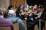 Violinists with the Black Diaspora Symphony Orchestra perform Sunday, Dec. 18, at Central United Methodist Church in Milwaukee, Wis. Angela Major/WPR