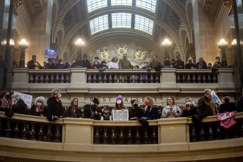 Protesters stand in the Wisconsin state Capitol after marching down State Street in support of abortion rights Sunday, Jan. 22, 2023, in Madison, Wis. Angela Major/WPR